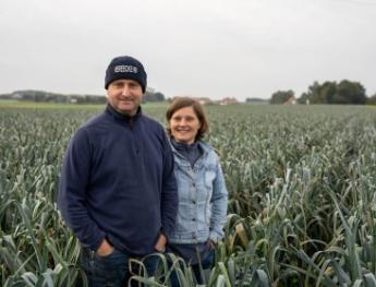 Landbouwers op perceel